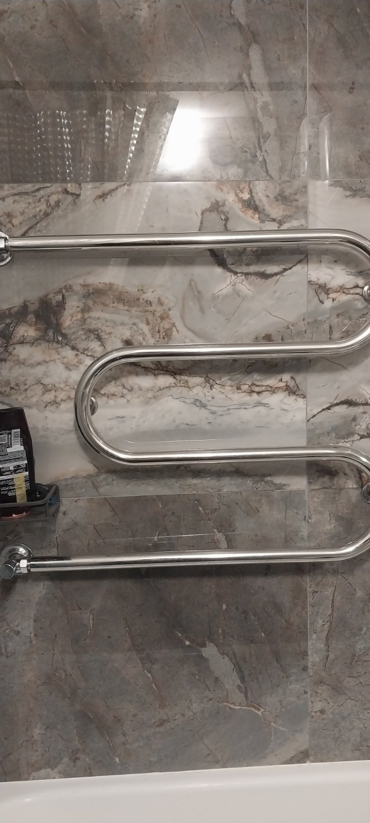 Фото  от покупателя Наталья к товару Полотенцесушитель